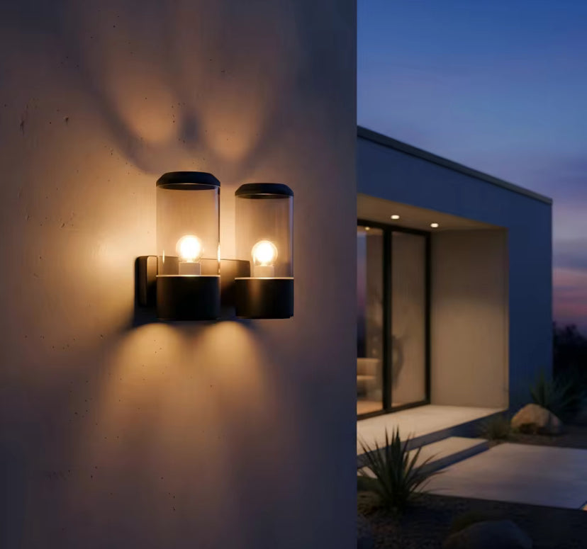 Lumièra Halo Glass Cylinder Wall Sconce modern wall light fixture on building exterior