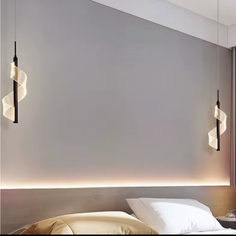 Modern bedroom setup with wall-mounted lights and a bed.