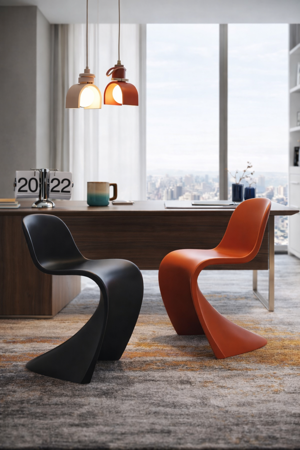 Modern office desk with modern Ula chairs, desk with Grotto Italian Expresso mug and cityscape view.