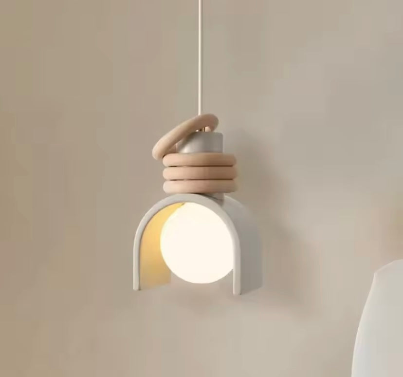 Modern pendant light with wooden accents is the Sol Arc pendant lamp in stone