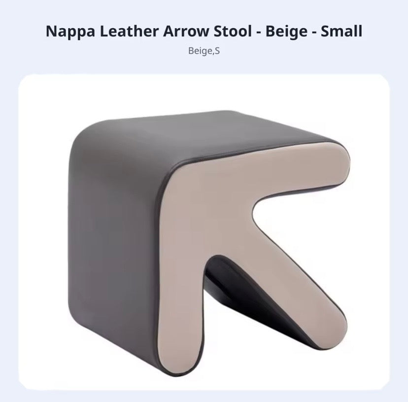 Napa leather arrow stool in beige and grey on a white background 